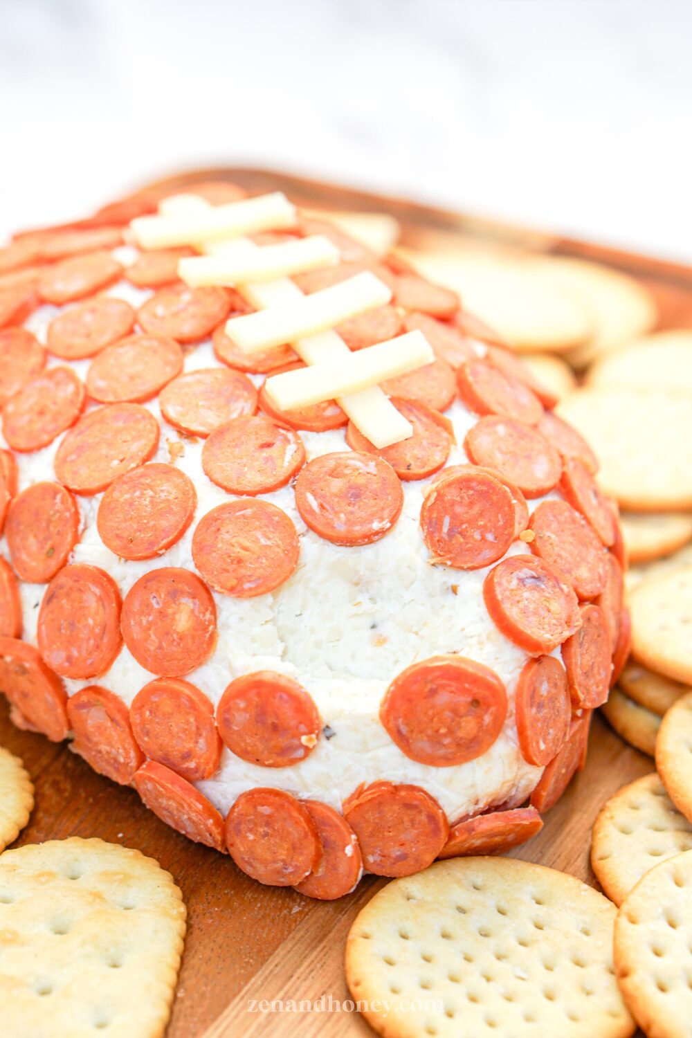 Football Shaped Pepperoni Game Day Dip ZEN AND HONEY football-shaped-pepperoni-game-day-dip-zen-and-honey